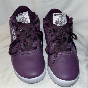Purple reebok with white bottom and purple dots.     Size 6.5